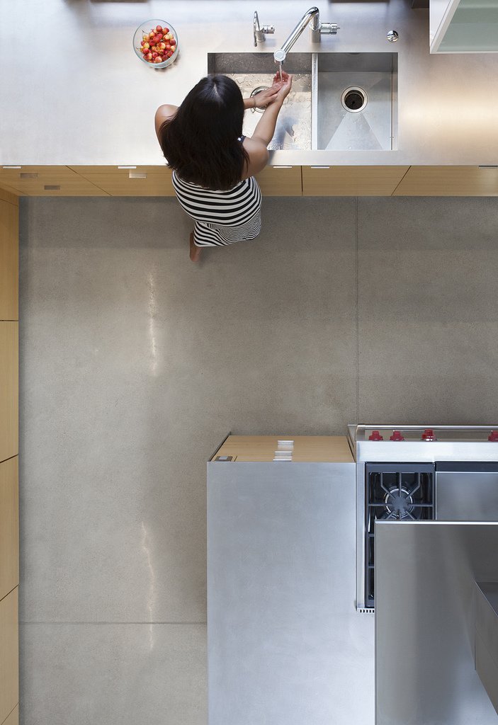 polished concrete floors and stainless steel countertops