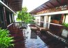 Modern home with Outdoor, Swimming Pool, Small Pool, Trees, Shrubs, Grass, Hardscapes, Gardens, Walkways, Flowers, Large Patio, Porch, Deck, Wood Patio, Porch, Deck, Decking Patio, Porch, Deck, and Landscape Lighting. Another most noteworthy feature is the well thought out design of the rainwater harvesting system which captures 100% of the rainwater that falls on the extensive 12000 square feet roof surface. During rains, the water is collected in the single central gutter where-from it flows down in the form of waterfalls, gargoyles and other attractive outlets and is finally channeled around the house where it is made to naturally percolate to the ground, thereby recharging the ground water table. There is an extensive network of subterranean channels around the site which is allowed to percolate to the ground. This intelligent arrangement goes a long way in replenishing the ground water in this area.
Photo 4 of The Flying House