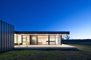 Two Families Embrace Off-Grid Living in This Sustainable Prefab Home - Photo 5 of 9 -