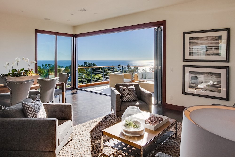Users should avoid placing heavy furniture near the glass walls.