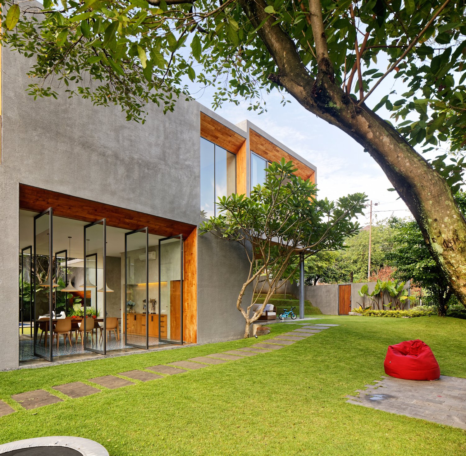 The house contains four bedrooms, one of which is presently being converted into an office.