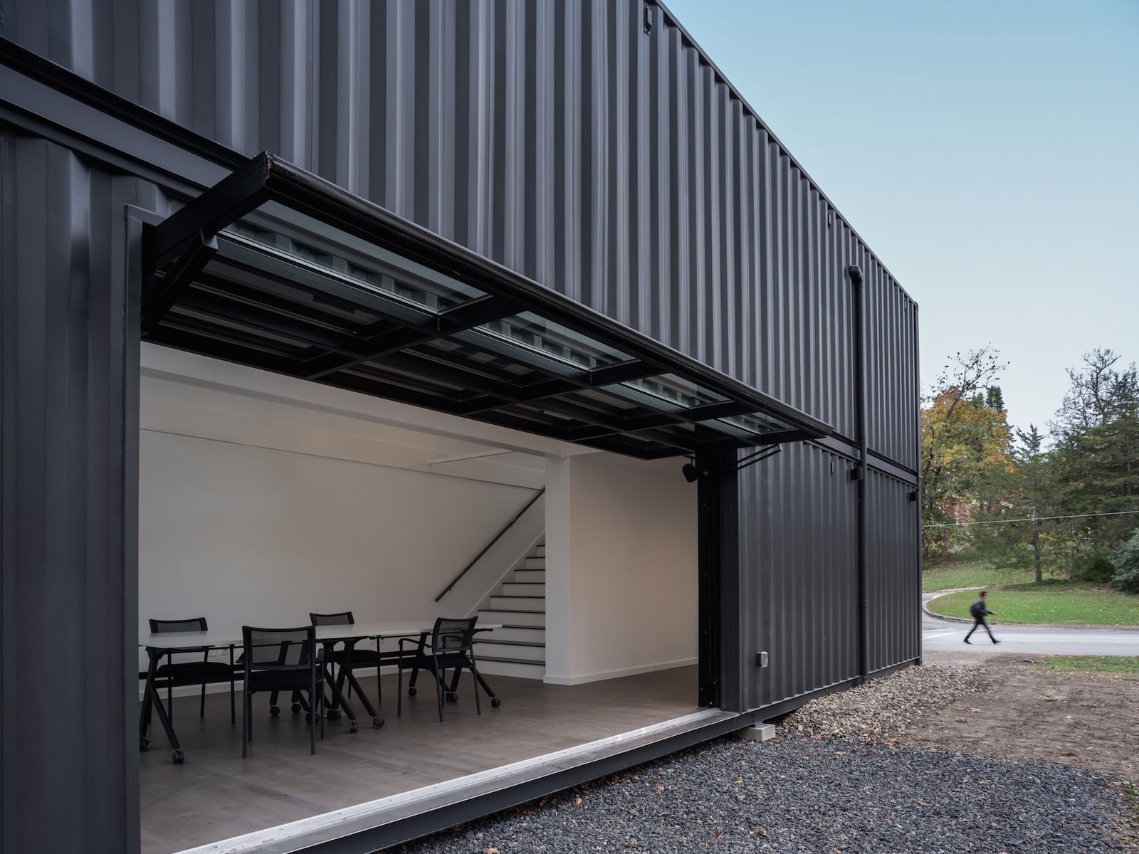 The Media Lab has been painted black to recede into the woods.