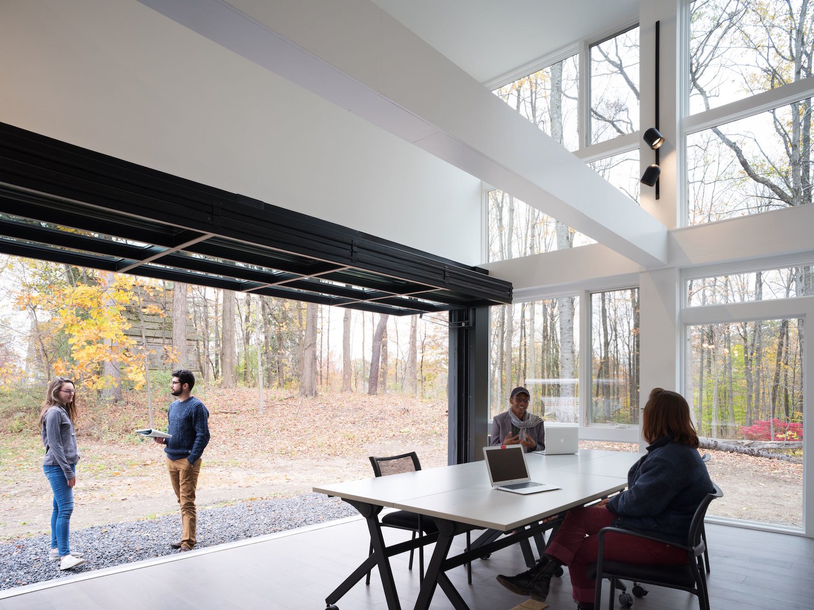 Ample glazing blurs the distinction between indoors and out.
