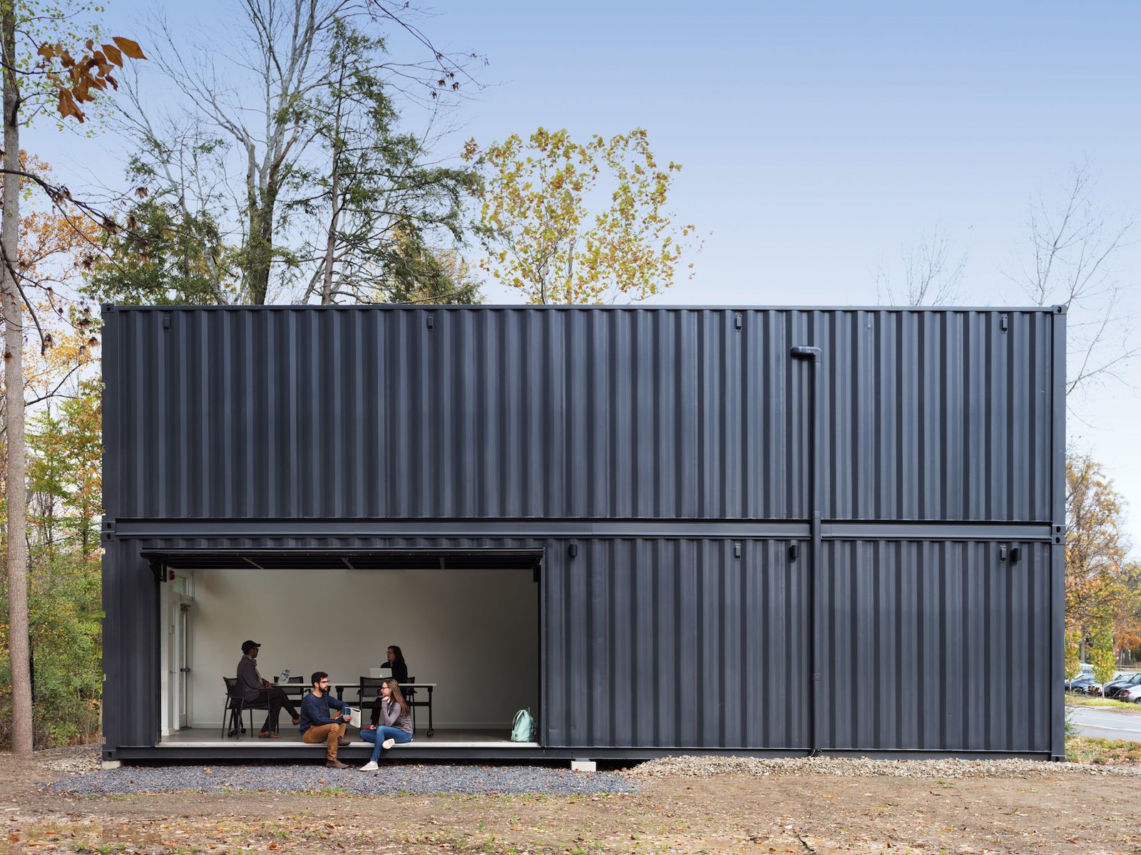 The main room opens to the quad through a large pivoting garage door.