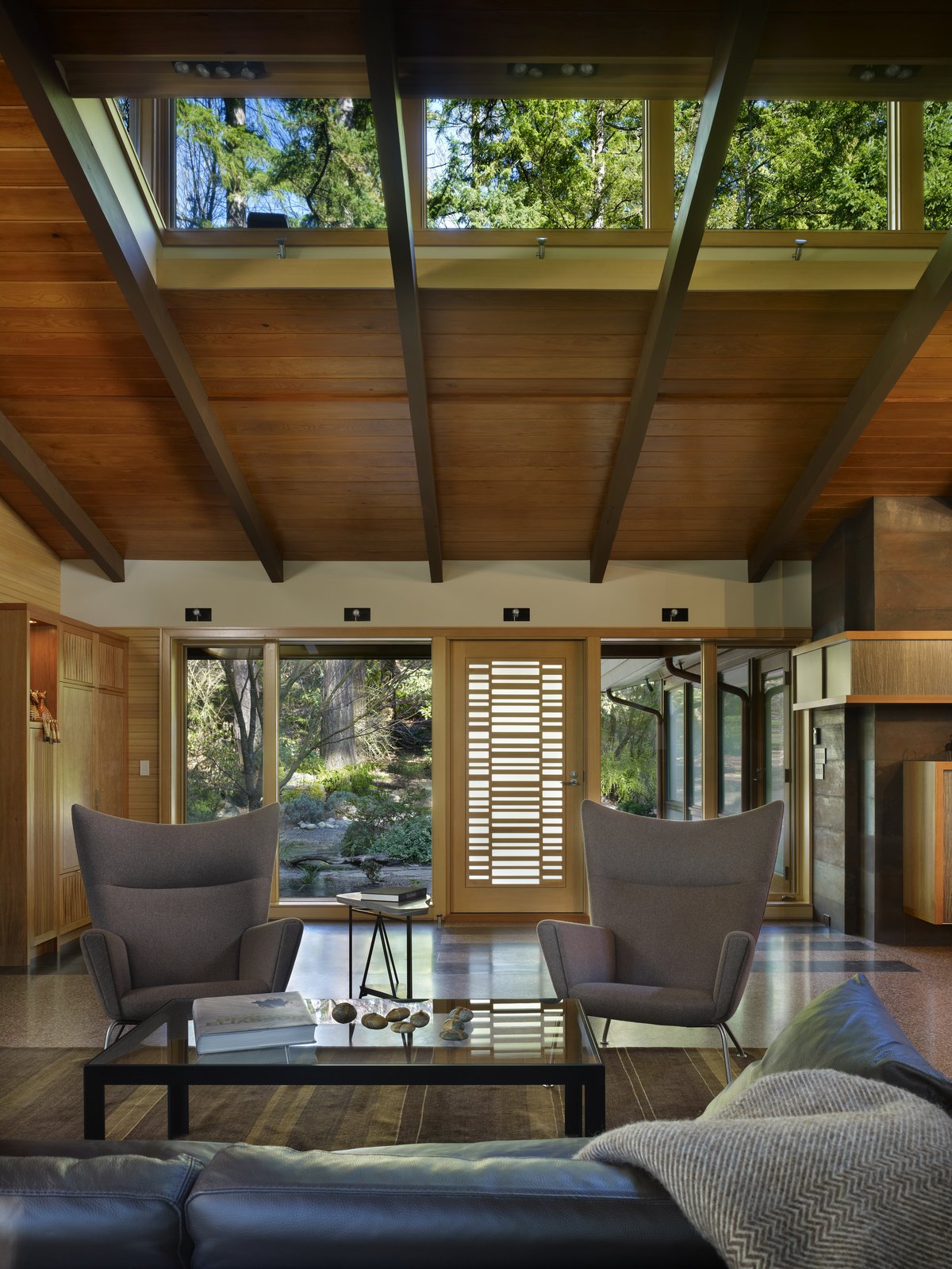 Interior view of living area and new entry glass wall