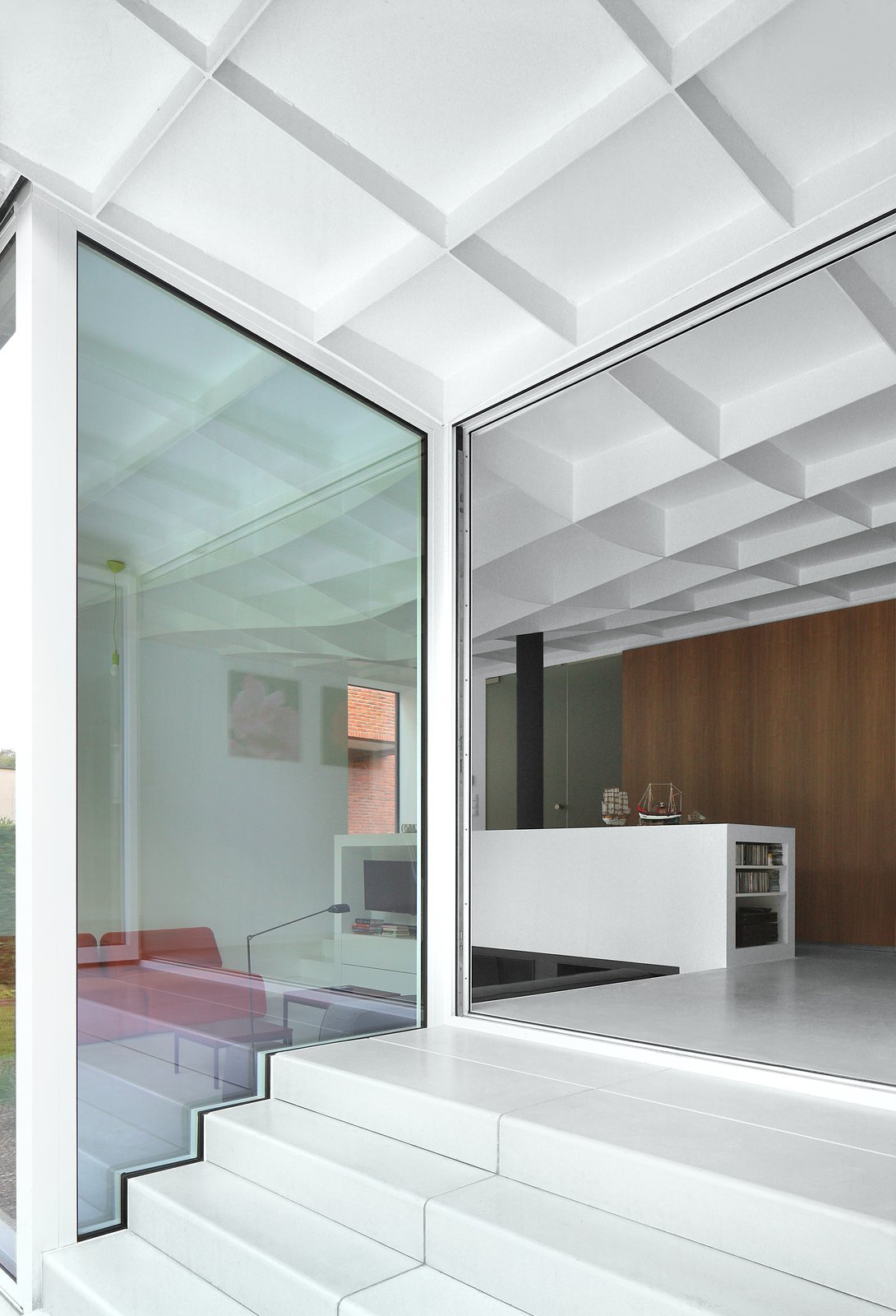 View from outdoor garden to addition interior