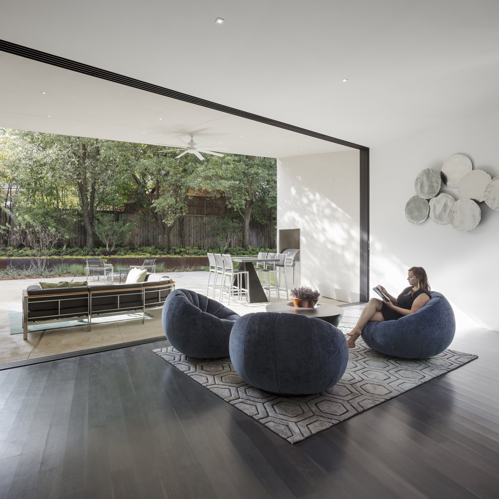 Two large multi-slide doors open up the main living space to the exterior. The opening picture faces west towards the back yard; it is 12' h x 24' w.